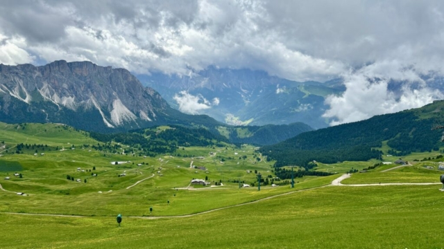 Aerial view of Seceda Dolomites showcasing the iconic ridge and surrounding Italian Alps.