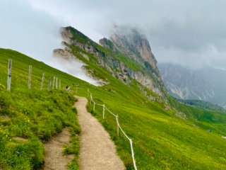 Sharp mountain ridge of Seceda Dolomites with jagged peaks and breathtaking drop-offs.